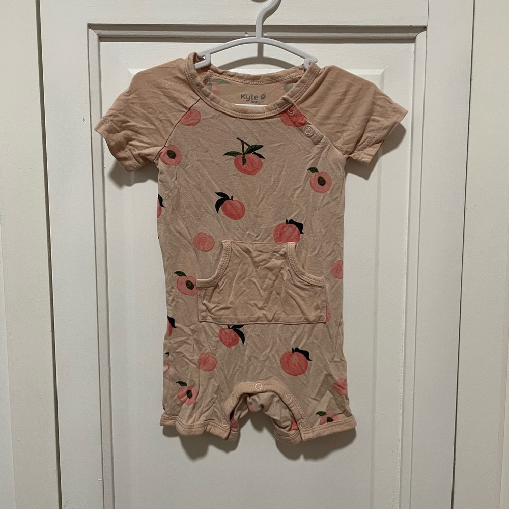 Kyte BABY Tan Romper with Peach Print